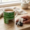 Fußball Tasse mit Fingerschuhen und Ball