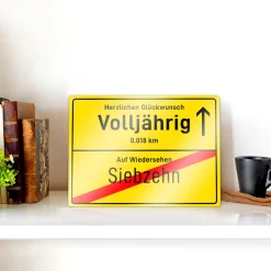Ortsschild zum 18. Geburtstag